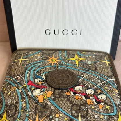 Gucci x Disney GG Supreme Donald Duck Billfold Wallet – Limited Edition Designer Leather Wallet | 70% OFF + Free 3–5 Day USA Shipping image 0
